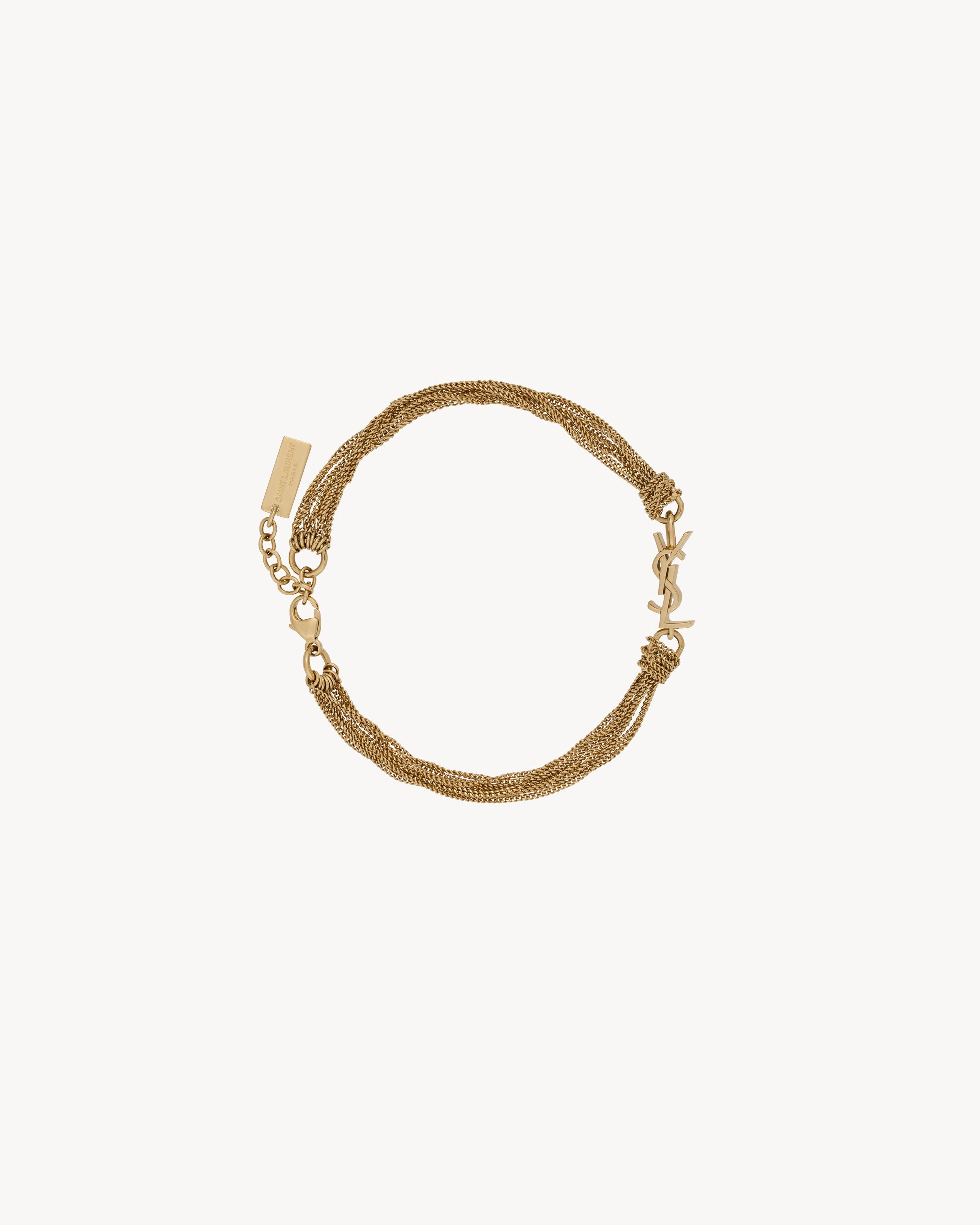 CASSANDRE tassel bracelet in metal